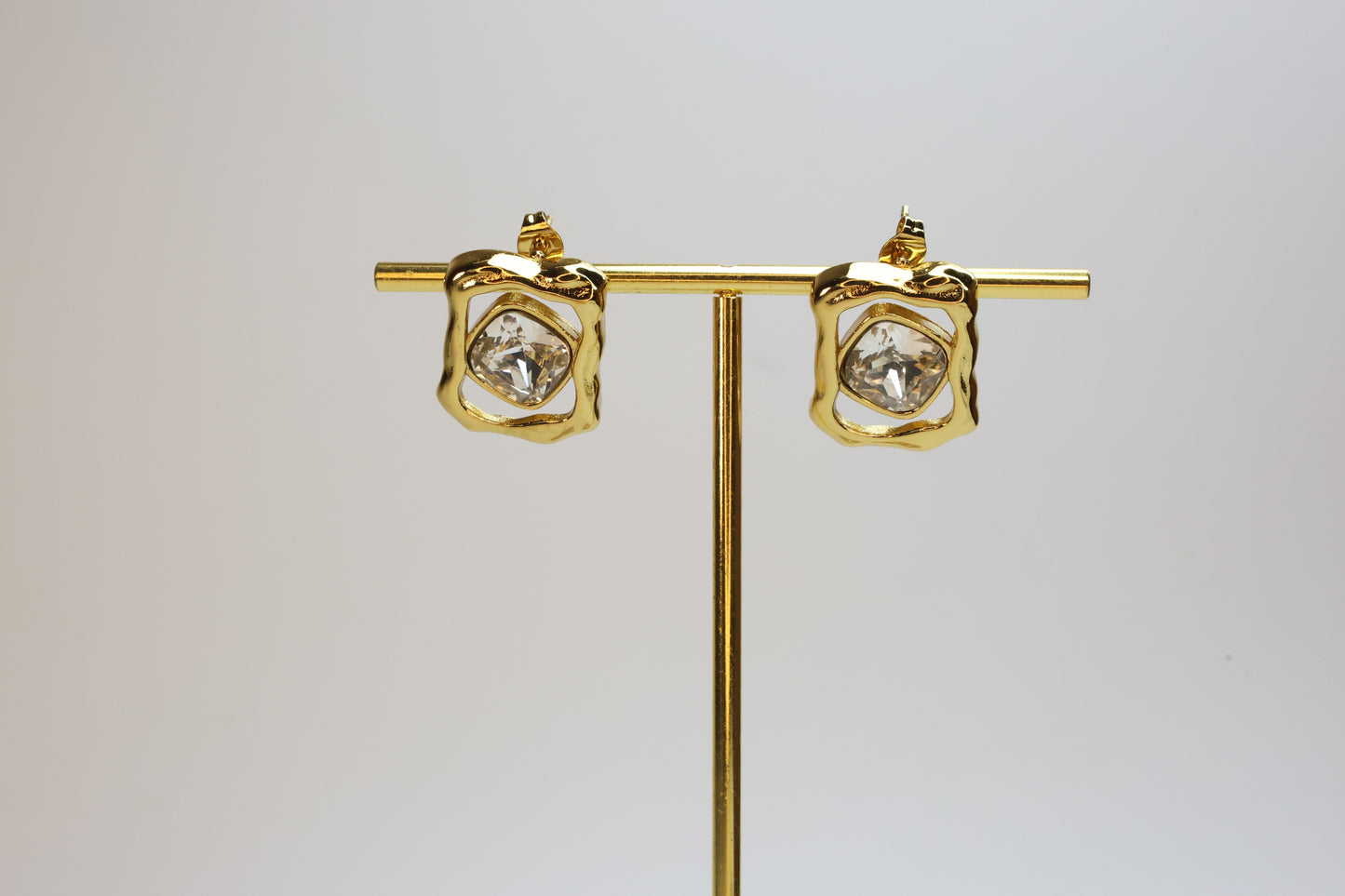The "Gem Cage" Studs